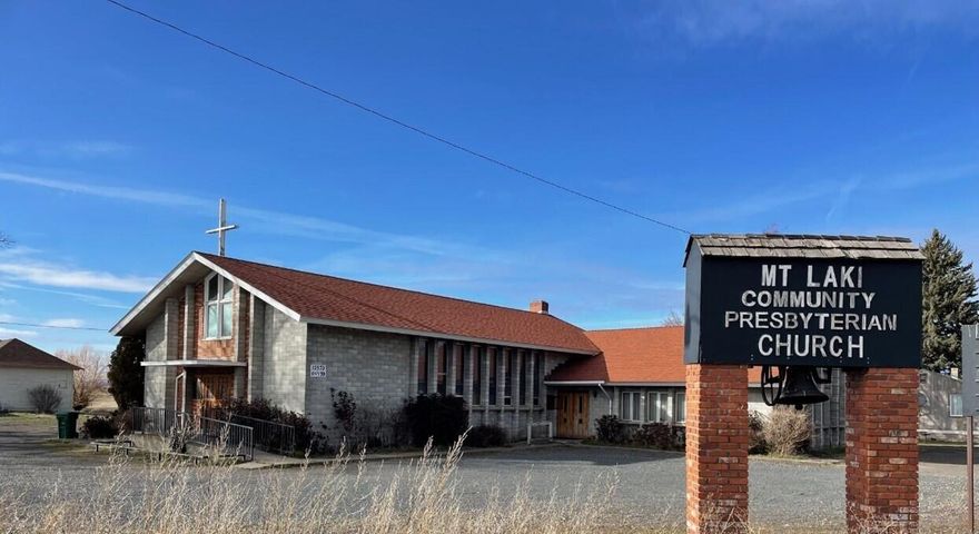 With change comes opportunity......perhaps a new mission church, preschool or daycare.  Or allow your imagination to create a new business opportunity on this two (2) acre commercially zoned property (4 lots).
Three buildings including a 1200 sq ft, 2 bedroom, one bath residence with detached garage.  The church has classrooms, a community gathering room and worship center; total 6200 sq ft. The wood schoolhouse was last used by the Southern Cascade Woodcrafters; buyer to conduct their own due diligence.   The well and septic serve all three buildings.   Audio/Video Surveillance.
