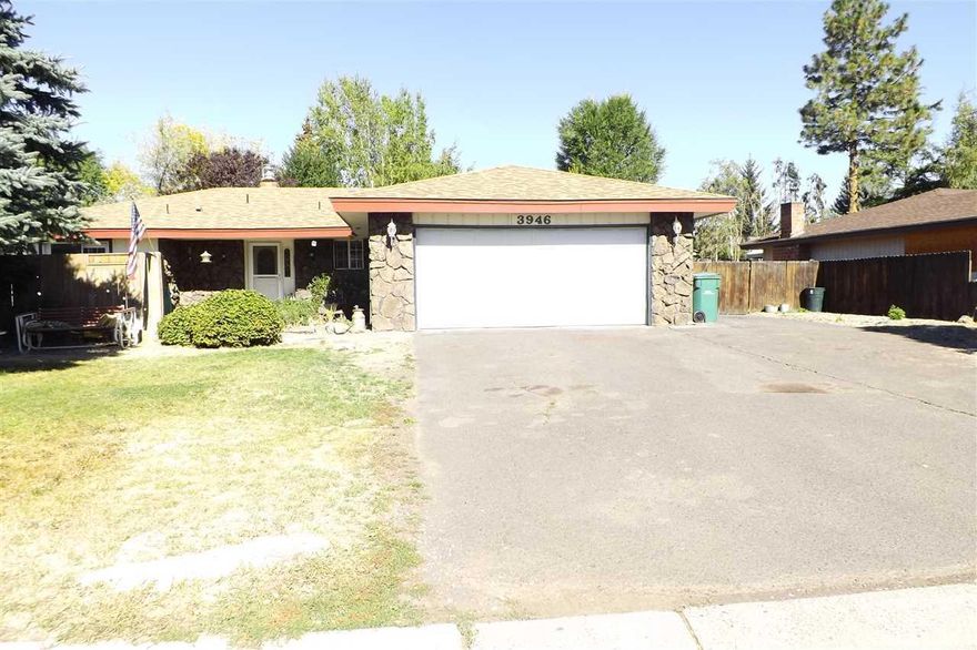 Great Suburban Home In Sunset Village! This Spacious 4 Bedroom, 2 Bath Home Features A Double Sided Fireplace, Open Floor Plan, Large Bedrooms, Separate Laundry Room, And Mature Landscaping All In A Desirable Location!