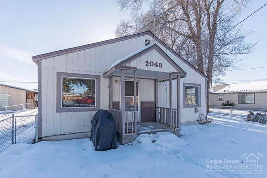 This cottage is cute as a button and so is the price. You will enjoy plenty of space on this .38 of an acre with plenty of parking. Recent upgrades include a new gas water heater and the septic was replaced in 2014. In the eat- in kitchen you will find a built in shelf showing the adorable 1948 character. There is also a large mud/ laundry room. This home is move in ready and waiting for you to make it your new home for 2017.