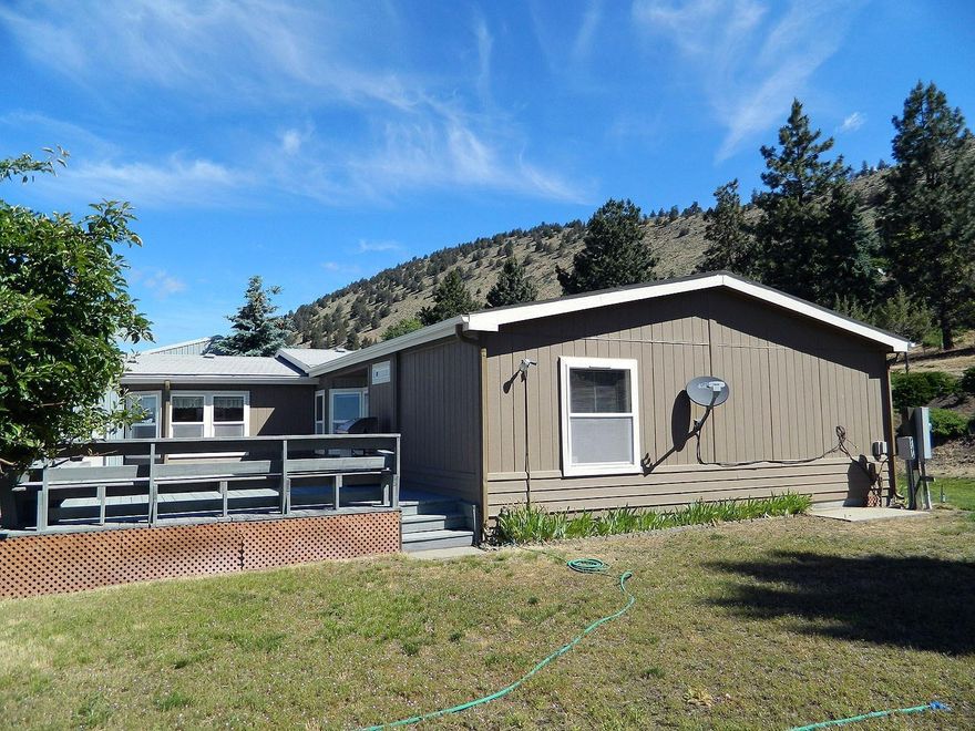 Don't miss out on this Pine Grove home with 1820 sq ft triple wide manufacture home over looking the basin and fantastic view of Mt Shasta. It is a split floor plan with a large master suite and large great room. You can sit out on your large 18x31 deck and take in one of the best views you will have of Mt Shasta you will find. There is a large 26x36 shop that just needs doors to finish it off. There is a work area in the shop with a concrete floor. The house is heated with a monitor heater and electric forced air.