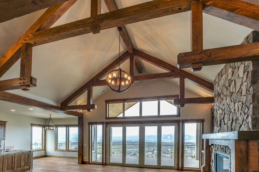 Fabulous, to be built, Chalet style home with VIEWS, and VIEWS, and VIEWS, by Rogue Valley's Builder of the Year; Sam Sarich Construction, Inc. Builder will customize the floor plan and square footage so the house fits your lifestyle. Current design has over 2,700 sf of main level living and a three car garage with an elevator to access the lower level which has another 1,868 sf. Finished home to include Sub-Zero and Wolf appliances, quartz countertops, hardwood floors, wine cellar, wet bar, dual-walk-in closets, wine room, concrete decking, ample tile, soaring ceilings, and reclaimed timber beams throughout. This is true craftsmanship in the 21st century. Welcome to Innsbruck Ridge Medford's most prestigious gated view community. Photos for illustration purposes only.