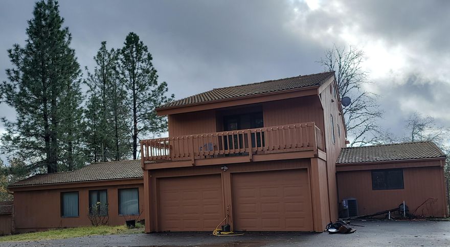 20.5 acres welcomes you to this gated 4 bedroom 3 1/2 bath home with vaulted ceilings, formal dining room. Primary bedroom downstairs and one upstairs that leads to balcony. You will love the kitchen with beautiful granite countertops and loads of cabinetry. Spacious and feels like separated living quarters. and entertaining. Sunroom and Deck.
Attached 2 car garage, fruit trees, Fenced backyard and gated. Backs up to BLM.  All information is deemed accurate but not guaranteed and subject to change at any time without notice.