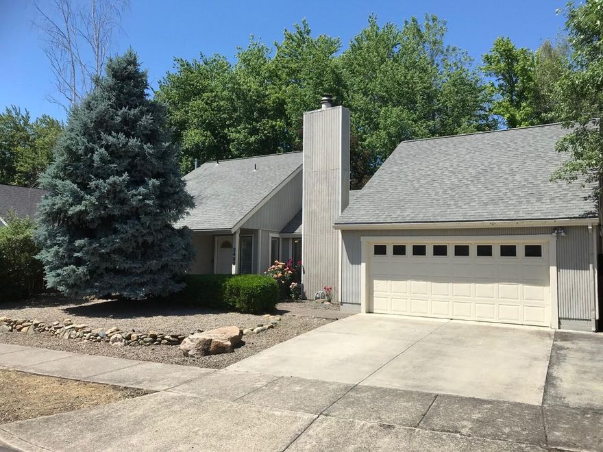 Spacious East Medford home with backyard access to the Lazy Creek Walkway. This home sets in a quiet neighborhood near Asante Regional Medical Center and medical offices. A livable open floor plan with 4 bedrooms, 2 baths, high ceilings, formal entry & a u-shaped kitchen. Flexible living area with 2 fireplaces, clerestory windows & a skylight. The master bedroom with walk in closet & private bath with soaking tub is up stairs on one side of the home. 2 bedrooms are downstairs and another large bedroom/bonus space is upstairs at the other end of the home. The attached garage offers good storage plus a shed in the backyard. Foundation issues make this a cash sale only.