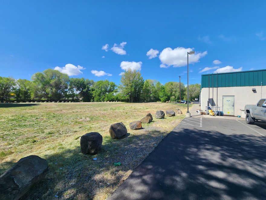 Rare opportunity to own .95 acres of commercial land on the creek in the heart of Prineville. Ideal for cabins, cafe, tap house, or boutique business. Central location with easy access, room for creative development, and a beautiful natural setting. Zoned commercial and ready for your vision create a destination in one of Central Oregon's fastest-growing communities.