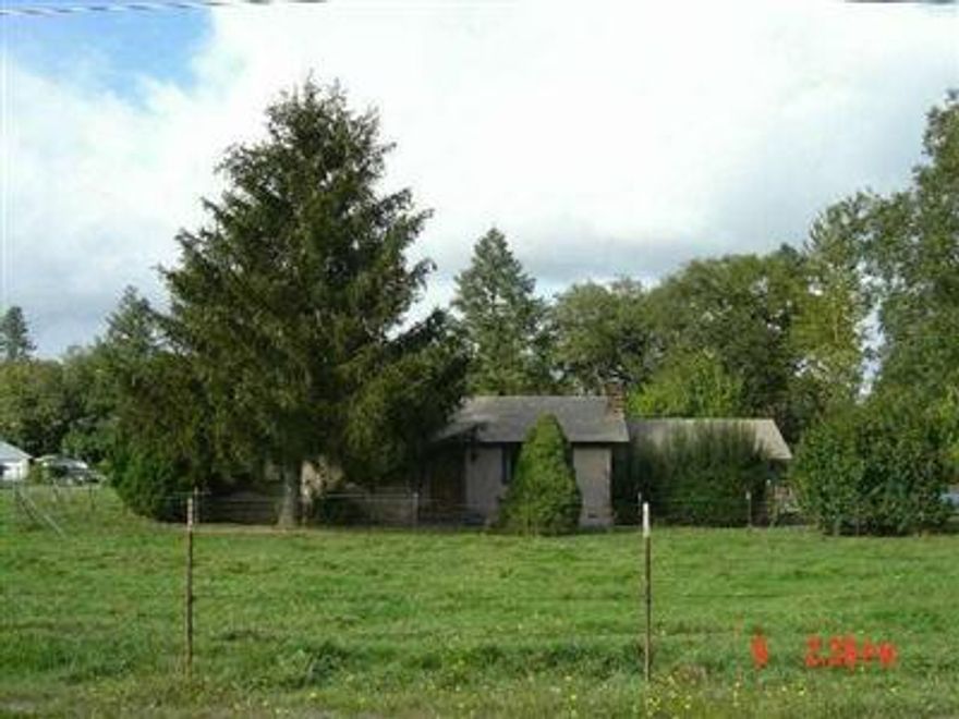 Excellent Location! Comfortable Ranch Style Home Needs A Face Lift. Do It Yourself & Save! Fully Fenced And Level Usable Acres. Large 2 Stall Barn (40x24), Shop (20x20) And Shed (36x24).