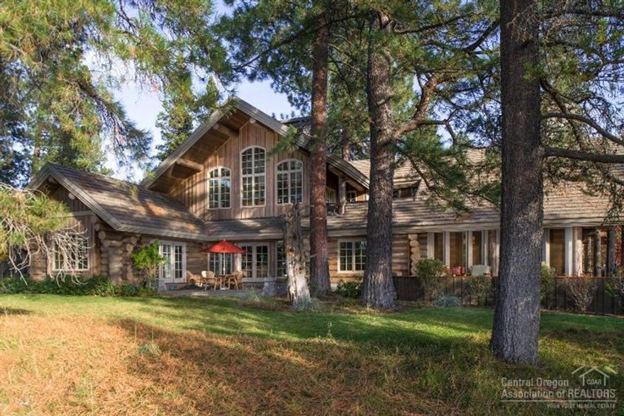 Exceptional log home estate on 2.1 acres in Vandevert Ranch! High soaring wood vaulted ceilings and beautiful interior log and river rock accents throughout. Located in a private, gated community just south of Sunriver, this home must be seen! Beautiful grounds, large deck and mountain views. This home has a spectacular recent kitchen remodel with slab granite counters, stainless appliances, tile back splash and more!