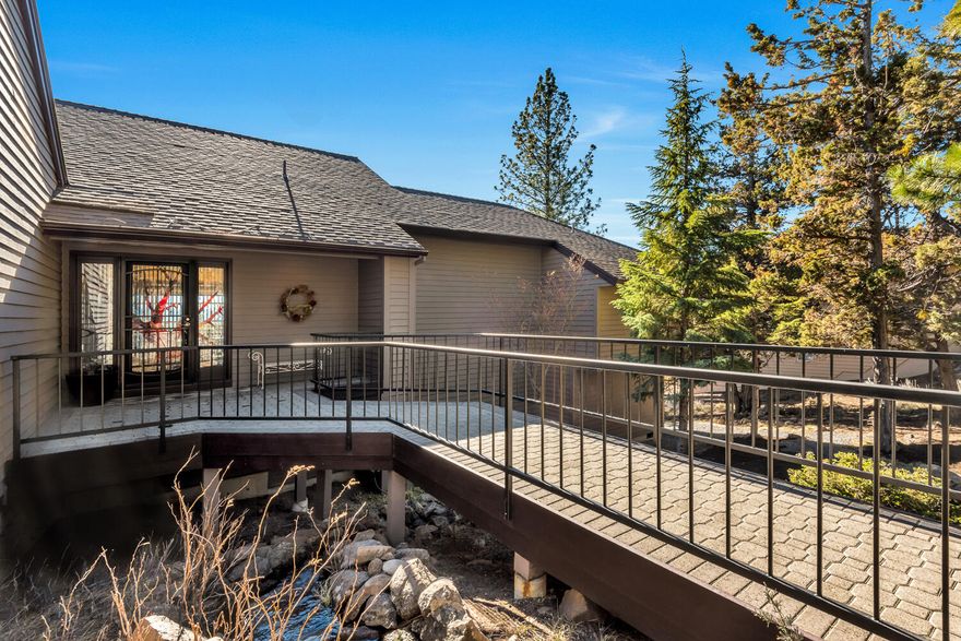 This beautiful, well maintained home on Awbrey Butte is nestled on a private and sunny half acre lot in the City View neighborhood. With over 2500 sq ft on 2 floors, this gorgeous home is perched for capturing the natural sunlight streaming in the floor to ceiling windows. The main floor features warm wood floors, soaring ceilings and a modernized, updated kitchen and a completely remodeled primary suite featuring a gorgeous private view, huge built in walk in closet, oversized walk in tile shower and soaking tub. Downstairs features additional bedrooms, office spaces, multi purpose bonus rooms and 2 private decks. Mature, low maintenance landscaping includes a water feature and pond. Enjoy the private setting and wildlife from this gorgeous home. The large driveway and 3 car garage has room for a shop and storage.