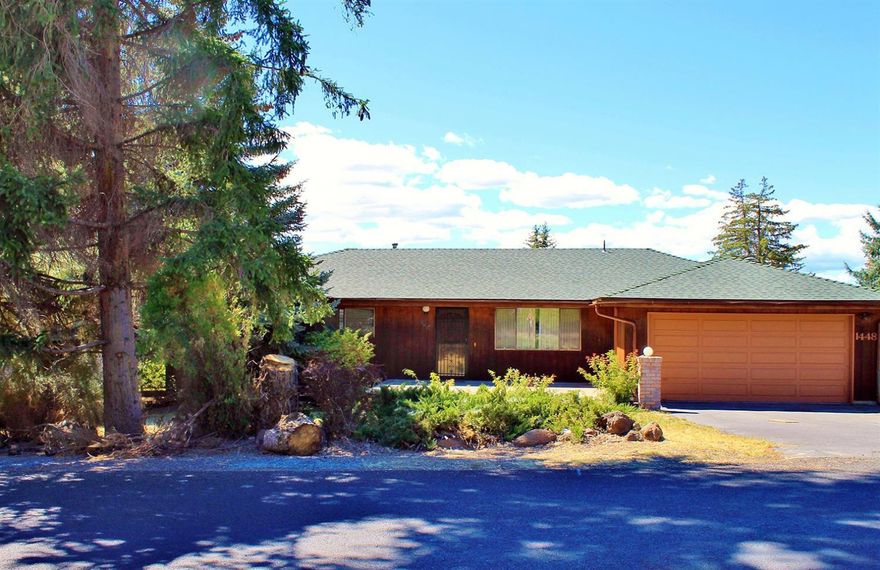 Beautiful 3 bedroom/2 bath home in the desirable Moyina Heights neighborhood! Lovely mountain & sunset views from the relaxing deck. Great for entertaining! This home boasts 1650 sq. ft., all new upgraded flooring and light fixtures, & has been freshly painted throughout the home. There is a shop & storage area, with electrical, work bench & shelving. Beautiful, mature pines & spruce trees, a prolific pear tree, & grape vines surround the home. A nice, shady patio in front and there is even room for your RV! This home is ready to move right in and enjoy!!!