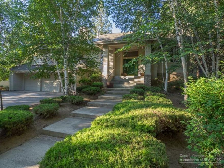 Immaculate 2,954 sq ft home in private, gated community. Pool, tennis, & acres of landscaped common areas. Reverse-living floor plan. Master and guest suite on main level. Kitchen, living room, family room & office upstairs. Office can be 3rd BR. Pozzi wood windows with plantation shutters & lots of custom built-ins. 2 wood-burning fireplaces. All this on nearly 1/2 acre on a quiet cul-de-sac. Triple-car garage too!