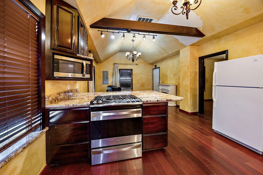 Excellent opportunity in East Medford...perfect for investors or first-time buyers! Recently updated with stylish finishes including granite countertops, cherrywood laminate flooring, and a gas cooktop for the home chef. The spacious primary suite offers surprising comfort and privacy. Convenient laundry room just off the kitchen. Enjoy the bonus of an oversized garage with plenty of storage or workspace. Don't let the exterior fool you...this home's interior is a must-see. Act fast before it's gone!