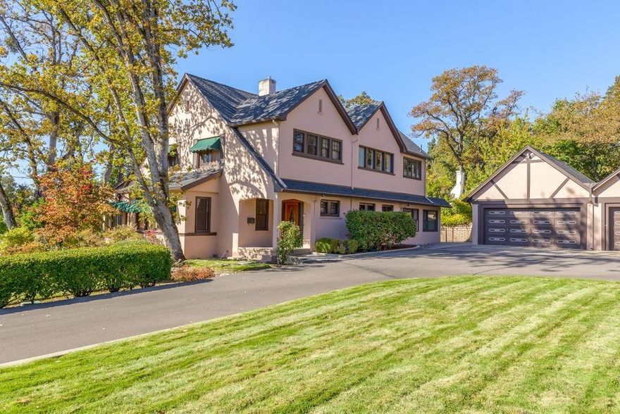 One of Medford's grand landmarks, this home has been in the same family for nearly 100 years. This beautiful estate was built in 1904 when East Main Street was simply known as County Road. In 1926, the home was sold to the family that owns it now. The generations have enjoyed raising children, large family dinners and warm, joyful holidays around the fire. Imagine living here, moving about your spacious 0.81 acre estate, watching the children in the swimming pool while you enjoy refreshments at the pool bar or the shade in the pool house. Do you love to garden or tinker in the workshop? Sprawling meticulously maintained landscaping awaits your floral touches or garden boxes. Behind the expansive set of garages is a dream of a workshop complete with a workbench, a sink and over 100 cabinet drawers for all your workshop desires. Inside, this roomy well-appointed home will welcome your entire extended family and friends to gather for any occasion. Cheers!