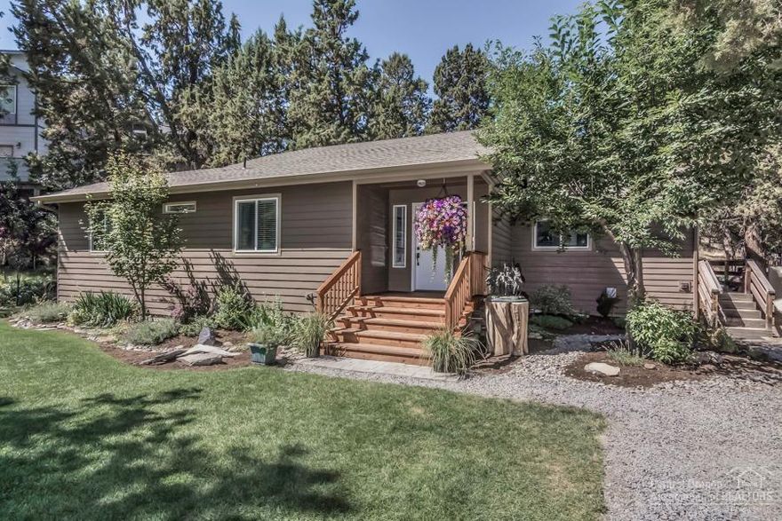 Welcome to Tumalo! This charming home boasts many modern updates & is nestled nicely on a .27 acre lot close to the Deschutes River. This single level 3 bedroom, 2 full bath home has nice separation, updated kitchen, hardwood floors and detached 2 car garage. Great outdoor space w/ spacious front yard, private back deck, beautiful natural rock outcropping's, colorful landscaping, irrigation & a fenced perimeter.Don't miss the fire pit complete w/grass surround & natural rock seating.Tumalo Schl. District!