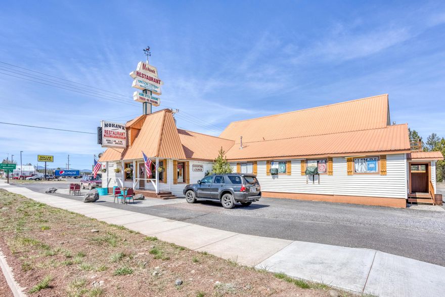 The Mohawk is a full-service restaurant and bar with approximately 1,500 sq ft of Living quarters above. The Business and Real Estate are included in sale. This viable business has been family owned and run for the last 37 years. The bar generates income from the additional lottery and Poker machines. The area is divided into 2 separate tax lots. The restaurant sits on 1.03 acre and the .56 acres is used currently by Crescent Creek Coffee, which could be sold outside of escrow. The 1.59 acre lot backs to a forested property and could be developed into RV Parking or cabins that rent out to the many travelers who enjoy recreation in Central Oregon. The restaurant is busy year-round with hunters, skiers, summer travelers, and great local support.  Agent is related to Sellers.