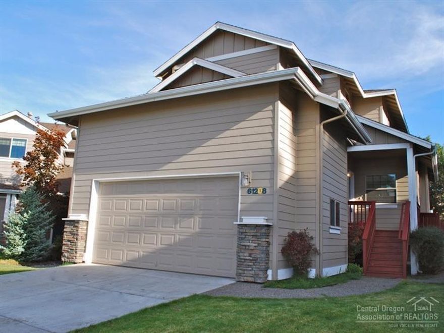 This lovely 4 bed, 3.5 bath home in SW Bend features a master suite on the main level, a spacious and open living, kitchen and dining w/ hardwood floors, tile counters, newer carpet, stainless steel appliances, washer and dryer, as well as newer plumbing fixtures, int./ext. paint and more. Upstairs features 3 BD, 2 full BA and bonus area. Property is located within walking distance to the Old Mill Shops, the Deschutes River and offers a spacious fully fenced yard w/ newly refinished decks.