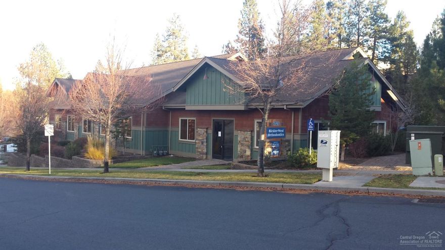 5.9% Cap. Highly desirable Westside office space across the street from proposed 4 yr. OSU campus. Include overhead projector and automated drop down screen. Easy access off Chandler Dr. Light and bright with ample windows. Carpet in perfect shape. Kitchenette/prep area. Beautiful finishes throughout including men's and women's bathrooms-shared space with Bickler Orthodontics.