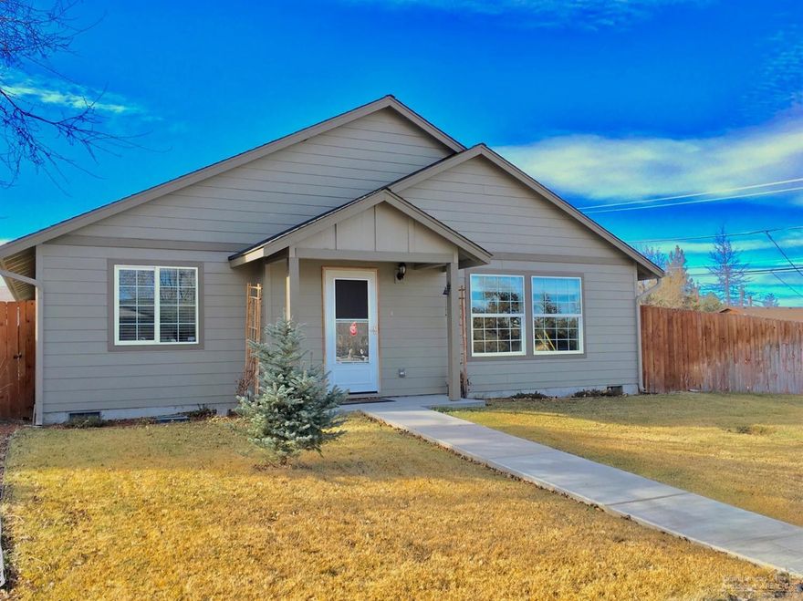 Bright and well maintained custom single level home. Attached 2-car garage and a detached 800 sqft shop heated w/ newer pellet stove, insulated and wired 220v. Covered and gated RV parking. Hickory cabinets, tile floors, and vaulted ceilings throughout. Stainless steel appliances in kitchen w/ 5-burner range. Low maintenance fenced side yard, covered patio, and raised garden beds. Located minutes to restaurants and shopping. Dry Canyon Trail access across the street.