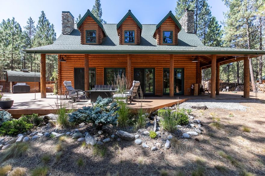 This riverfront paradise with a dock is a very rare opportunity to own a remodeled main lodge with 5 outbuildings (larger office outbuilding plus 4 tiny structures) as well as a 30'x30' pole barn for RV/ boat/ toy storage. 3 RV hook-ups on site. Remodeled lodge features Dacor appliances, Thermador built-in espresso maker, riverstone wall with fireplace, and expansive windows with views of the river. Full baths with stone showers are on each level, including the double sleeping loft upstairs. Paddle, kayak or float right off your dock and entertain friends from the large deck and grounds. Miles of State Park trails are just steps from the home. The entire property may be a short-term rental but individual outbuildings may not be rented separately.