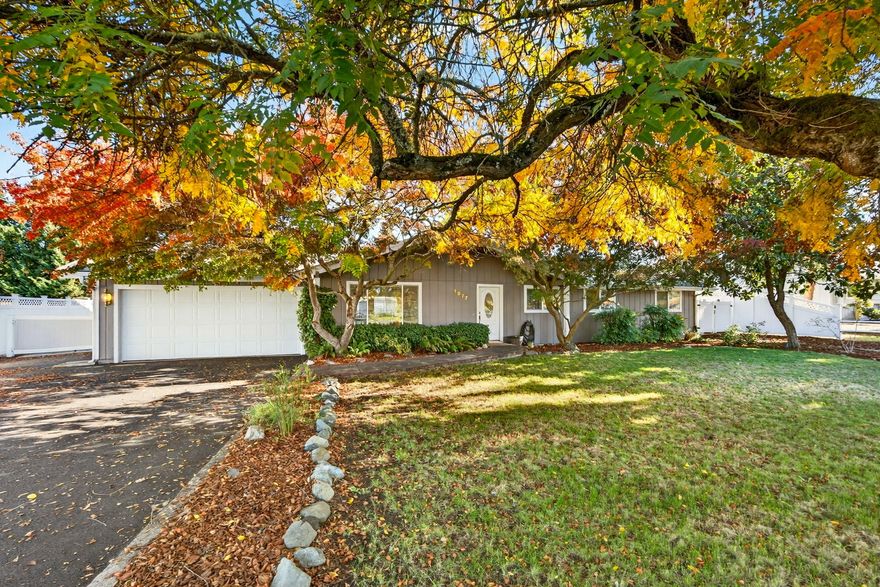 Welcome to this extensively updated multigenerational ranch-style home in desirable SW Medford. Enjoy a peaceful country setting across from orchards, cornfields & a pumpkin patch, minutes from town and near Griffin Creek Elem. Beautifully updated kitchen w/ farmhouse sink, SS appliances, soft-close cabinets & walk-in pantry. Tastefully updated baths, LVP flooring, vinyl windows & 6-panel doors enhance the home throughout. Separate living area with private entrance, bedroom & bath—ideal for family gatherings, guest quarters or ADU conversion. Enjoy outdoor living on private .48-acre lot, solar heated pool w/ removeable safety fence, pool house, shop, garden shed, raised beds & basketball court perfect for summer evening outdoor movies. Additional features include 7-ft white vinyl fencing, new blacktop driveway, large RV parking, ADA friendly, all appliances included. Perfect blend of country tranquility, family friendly spaces & modern comfort.