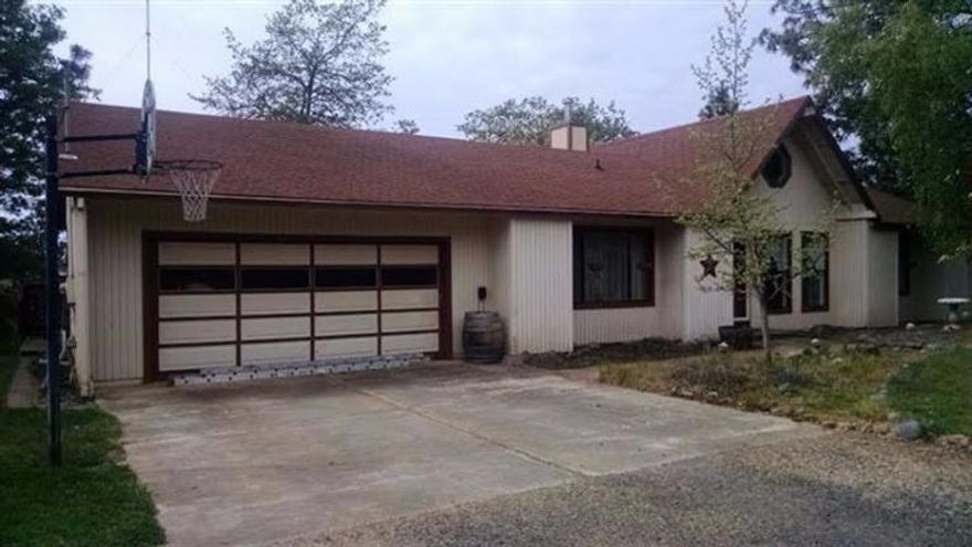 Gorgeous country home with great fencing, barn, above ground pool all on over 9 acres! As you pull into the driveway notice the white vinyl fencing and barn to the right. There are pastures and an area for a round pen. As you open the gate you will notice mature trees and landscaping. Inside the home the high vaulted knotting pine ceilings and Bay windows will give you the feeling your are in a private resort. The kitchen has granite counters with a dining area that offers great views. This 1592 sq.ft. split floor plan offers comfort and has a great natural flow with 3 bedrooms and 2 baths. The deck outside is great for entertaining or just enjoying the views. There is a garden area, seasonal creek and more. The barn has stalls, a wash area and storage. There is a finished room with a bathroom that would be great for an office. Wonderful property that offers privacy, wildlife and more!.
