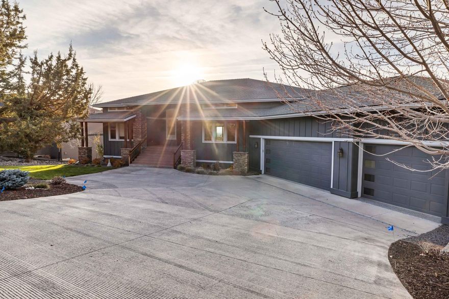 Nestled in the prestigious Eagle Crest community, this magnificently updated residence offers an extraordinary blend of luxury and comfort across 3,570 square feet of thoughtfully designed living space. Commanding panoramic views of the Cascade Mountains serve as a perpetual backdrop, visible from nearly every room through expansive windows that flood the interior with natural light.
The main level features an impressive great room, entertainer's dream kitchen, formal and casual dining spaces, a luxurious primary suite, dedicated office, laundry room, and half bath for guests.
On the lower level you will find a large family room with built-in entertainment center, gas fireplace, two guest rooms, 1.5 baths, and a huge storage space. This residence offers seamless indoor-outdoor living with multiple deck spaces and a patio, all positioned to capture the majestic mountain views. Located minutes from hiking trails and resort amenities. Oversized 3-car garage with shop possibilities.