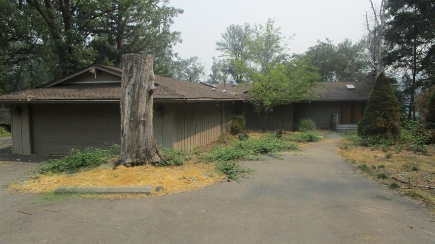 On the Wild & Scenic Rogue River. Home on nearly 7 acres. Main house features 3 bedrooms, 4.5 bathrooms and 3,313 square feet. This property needs someone to bring it back to its glory days as the Riverbanks Inn. Additional dwellings on property include cabin, bunk house, guest cottage and 4 bay garage/barn. Large pasture includes mare motels, bring your horses, cows, llamas, etc. Sold As-Is. Seller will provide a standard Seller's Addendum once an offer has been accepted. See attachment for PAS requirements and WFHM offer submittal information in MLS document section.