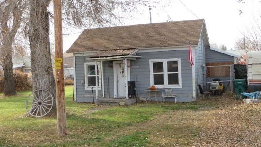 Small home in Merrill situated on .25 acre (1 1/2 lots). This is a great little fixer in need of exterior paint. Newer vinyl windows and Toya space heater. Property used to have an additional dbl wide manufactured home on it, but it's been removed. All hook-ups are still there. (Buyer to do own due-diligence regarding placing another home on the property.) Lots of off-street parking in back off the alleyway. 2nd bedroom does not have a built-in closet. Property is being sold in as-is'' condition. Owner will make no repairs. CASH sale only! Property is currently rented so 24 hour notice is required to show. Investors; Tenant would like to stay and continue renting.