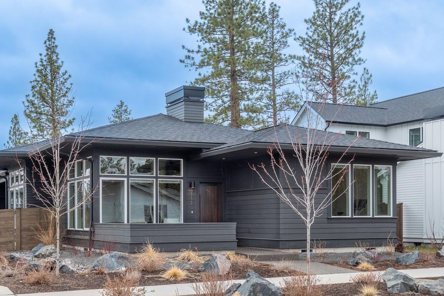 Stunning single level home in one of Westsides newest and exciting community, Discovery West. 3 bedrooms, 2 bath, 1,306 sqft with open floor plan, floor to ceiling windows, quartz counter tops, custom tile and kitchen cabinets, stainless steel appliances, dual showerheads and heated floors in the master bathroom and a 3 car garage for all your central Oregon toys. All of this is located on a corner lot with fully landscaped and fenced back yard with a gorgeous custom firepit to enjoy the cool nights.