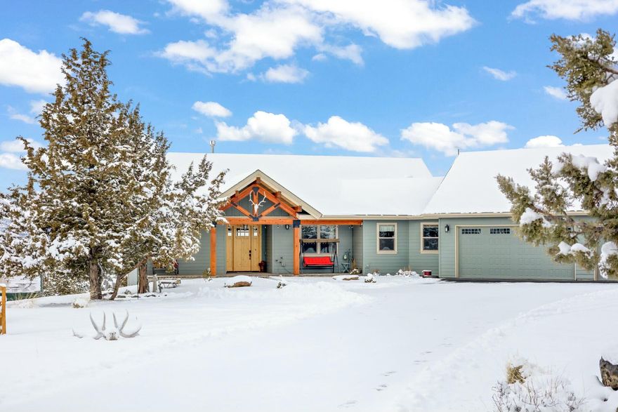 This stunning custom-built home, nestled on 8.28 acres, offers breathtaking, unobstructed views of the Cascade Mountains. With 3 spacious bedrooms, 2 beautifully appointed bathrooms, & an office/hobby space. The open-concept kitchen features granite countertops, a large pantry,& high-end finishes, while vaulted ceilings throughout add to the sense of openness & elegance. The living room has floor to ceiling stone fireplace, 9' ceilings throughout, as well as incredible solid wood trim work, & huge, bright windows that let in an abundance of natural light. The expansive decks provide the perfect spot to relax & take in the sweeping Mountain views. The oversized 3+ car garage offers plenty of storage and space for all your needs. There is also, an outside covered RV carport.  Located in a peaceful, dead-end cul-de-sac with paved roads, this property offers both privacy and convenience just minutes to town & all the recreational opportunities Prineville has to offer.