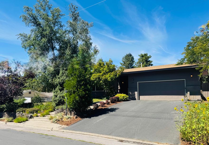 This beautiful ranch style home is ready for its next owner.  It has gorgeous hardwood floors throughout with a perfectly appointed kitchen, lovely cabinets and butcher block counters.  All windows are wood encased and add a wonderful elegance to the home and allow ample sunlight to drench the living space.  This home is located in the hot springs neighborhood, close to Skylakes, OIT, and downtown.
