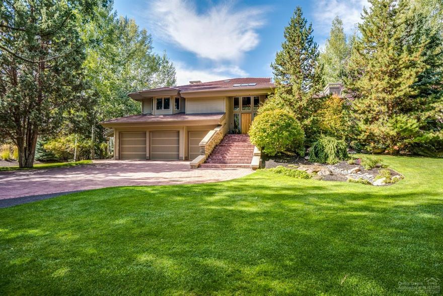 Idyllically located on a premier .54/AC lot in Broken Top, this home offers unobstructed views of Mt. Bachelor & absolutely phenomenal views of the 4th fairway, green and signature water feature. Extensively remodeled throughout, the light-filled Great Room highlights an exquisite stacked stone fireplace, hardwood floors & huge windows to take in the sweeping views. Chef's DREAM kitchen with solid surface countertops, professional grade stainless appliances, large working island, & fantastic walk-in pantry. Private main level Master Suite with 2 walk-in closets & a spa-like master bath like no other. Secluded main level office/den overlooking the course with gas fireplace. Downstairs features 2 en-suite bedrooms, flex space, craft room & fabulous utility room. Enjoy the park-like setting backyard and the expansive decking...ideal spaces for entertaining & relaxation. Oversized 3 car garage with plenty of space for all your Bend gear. A rare find and a truly remarkable home.