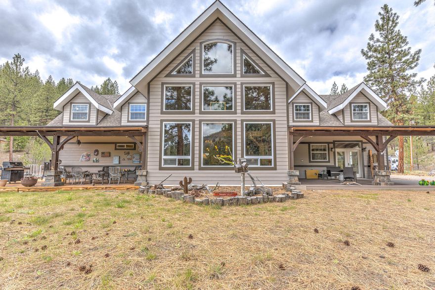 This beautiful custom, 3,588 sf timber Frame home on 160 acres in the beautiful Mill Creek Valley East of Prineville has beautiful views and privacy!  This 3 bedroom, 3 bath home boasts a large great room with exposed beams, vaulted ceiling and view of Mahogany Butte; in addition to a large primary suite, guest suite, wet bar and utility room on the main floor. Upstairs has a loft area that can serve as as family room, in addition to bonus room and an additional bedroom and full bath.  The structural insulated panels and radiant floor heat make this home energy efficient.  The detached garage has room for 2 vehicles and space for a utility vehicle.  This property qualifies for 2 Rocky Mountain Elk and 2 Mule Deer LOP tags (buyer to verify with ODFW).