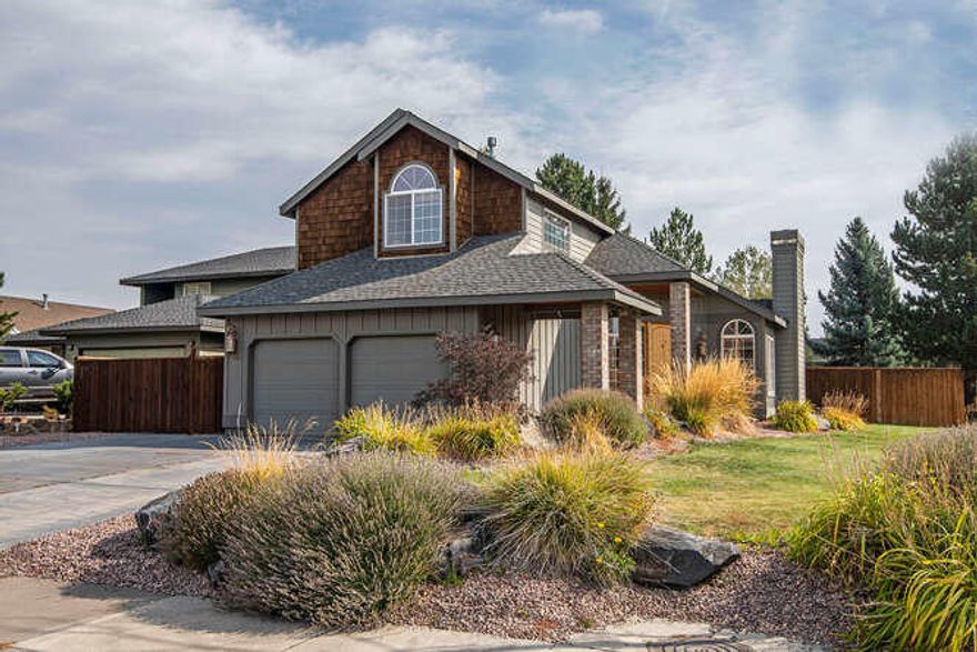 A wonderful, move-in ready home in a quiet NE Bend neighborhood.  Lovingly cared for and tastefully updated in spots. This corner lot has been well maintained and offers ample yard space, RV/boat storage, and a quality built shed in the side yard. Inside the home features teakwood plantation shutters, granite counters, updated bathrooms, and fresh paint. Peak-a-boo mountain views from the upstairs bedrooms and clean engineered hardwoods throughout the downstairs. This home is quality inside and out.