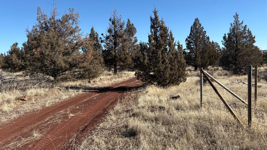 Own a piece of privacy and solace with this 19.96 acre parcel located in desirable Powell Butte, Oregon!  Wander past farms and cattle ranches with stunning Cascade views along the way. This property is just a 17 minute drive from Redmond!  Vested right for CUP in place, septic feasibility approved for capping fill system, well needed, CEC power needed, fully fenced, old growth juniper trees, views of Powell Butte to the south and potential for Cascade Mountain views to the west. Looking for end-of-the-road peace and quiet with some elbow room and more?  This is it!