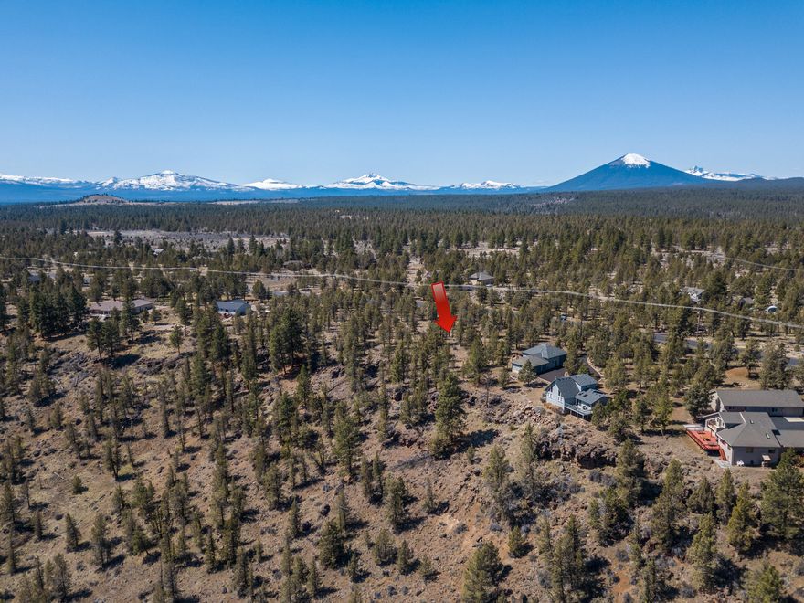 2.55 acre Lot overlooking Whychus Canyon right outside Sisters, Oregon. Here is your chance to build your dream home with plenty of buildable space and privacy provided by old growth juniper trees, sage and rock features . Stunning canyon views. Paved community with access to electricity, Avion Water, and phone all at the road. CC&R's are established and no association fees.