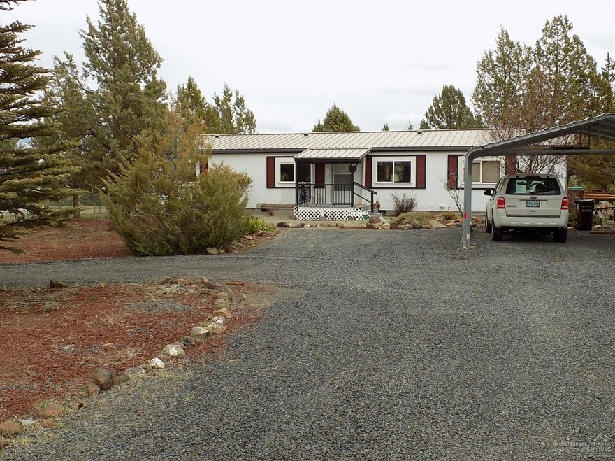 Large 3 bedroom 2 bathroom double wide home on 2.1 acres only 4 miles from town! This 1620 square foot home has had some nice updates done to it. Covered front porch, a carport to park under, and a storage shed! Plenty of room to build a shop, and some good views too! Call or text today for a showing