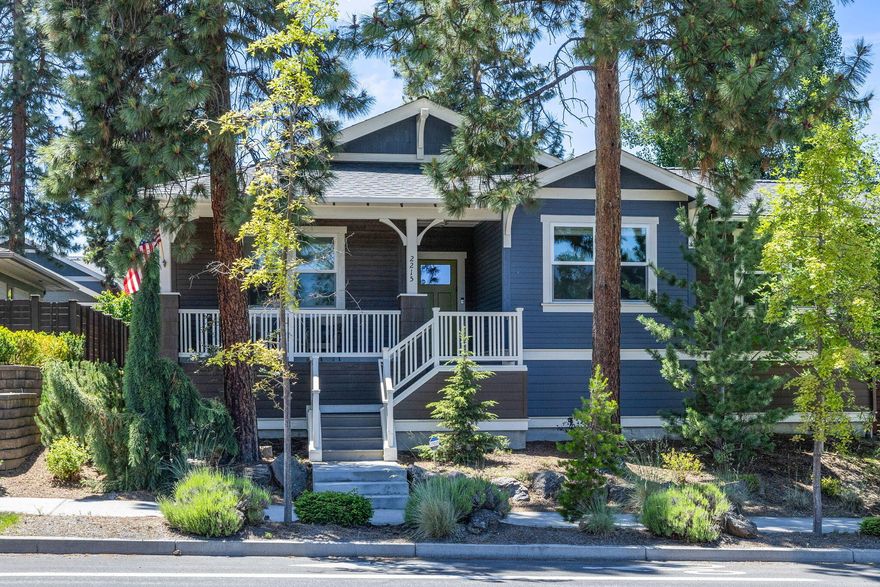 This darling SINGLE level home in NWX has a craftsman style exterior w/modern, artistic touches inside. Charming w/quality finishes & details such as beautiful & unique light fixtures, wood wrapped windows & more. An open floor plan w/gas FP is warm & inviting however you will likely gravitate to the beautiful chef's kitchen. A large concrete island w/multiple seating is inviting & beckons one to cook & entertain. When it's time to relax you have the choice of a fun little wine room or perhaps to chill on the deck.  The patio has a fire pit, grassy area with beautiful trees & is fenced. The primary BR has a large walk-in closet, deck access & nice separation from the other 2 BR. A large DBL garage has workshop area & a nook which could be perfect for a home office/hobby space. Solar panels are seller owned. Home has Earth Advantage features. This wonderful home in a fun, vibrant community, has great walkability to shopping, restaurants, parks, farmers market, Phil's trail.