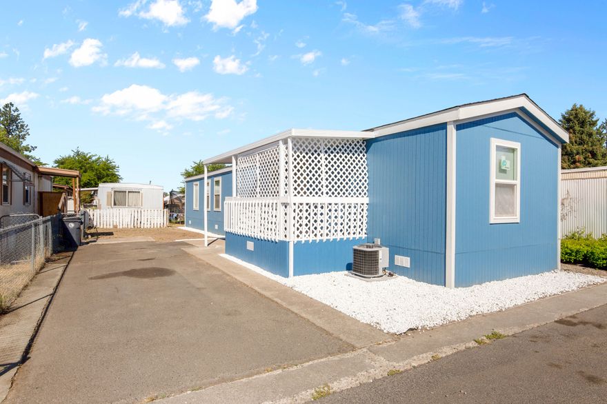 Fully Renovated & Move-In Ready! Step into this beautifully remodeled 1993 mobile home that feels brand new after a complete renovation in 2025. Inside, you'll find stunning new floors, a modern kitchen with brand-new appliances, and fully updated bathrooms featuring new toilets, tubs and so much more. Fresh interior and exterior paint bring a bright, inviting feel, and the 2x6 wood wall construction gives this home a solid, traditional-house feel—no ''mobile home'' vibes here! The high ceilings and open-concept layout create a spacious, airy atmosphere perfect for entertaining or relaxing. Enjoy your mornings or evenings on the private covered deck, complete with outdoor carpet for comfort and style. This home blends comfort, quality, and modern design—ready for its new owner to love! Owner will pay 2 months of space rent.