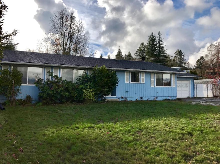 Great 3-bedroom/2-bath home on a spacious corner lot, conveniently located to schools and shopping. Access from two sides with parking for RV or other toys behind fence. French doors access the wonderful fenced back yard and covered patio from the great room. The attached 2-car garage is oversized, and there is a very nice shed for additional storage. Plenty of off-street parking for RV or additional vehicles. Inside there's a large living room with vaulted ceiling, as well as a wall of windows. Clean and priced to sell!