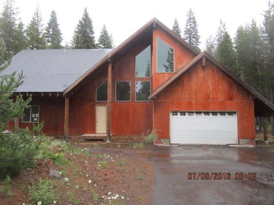 Here is your opportunity to own a property in desirable LakeWoods Village. Finish it to fit your needs. Lots of work is needed, including a new roof. Located near lake of the woods and many year round activities for the whole family.