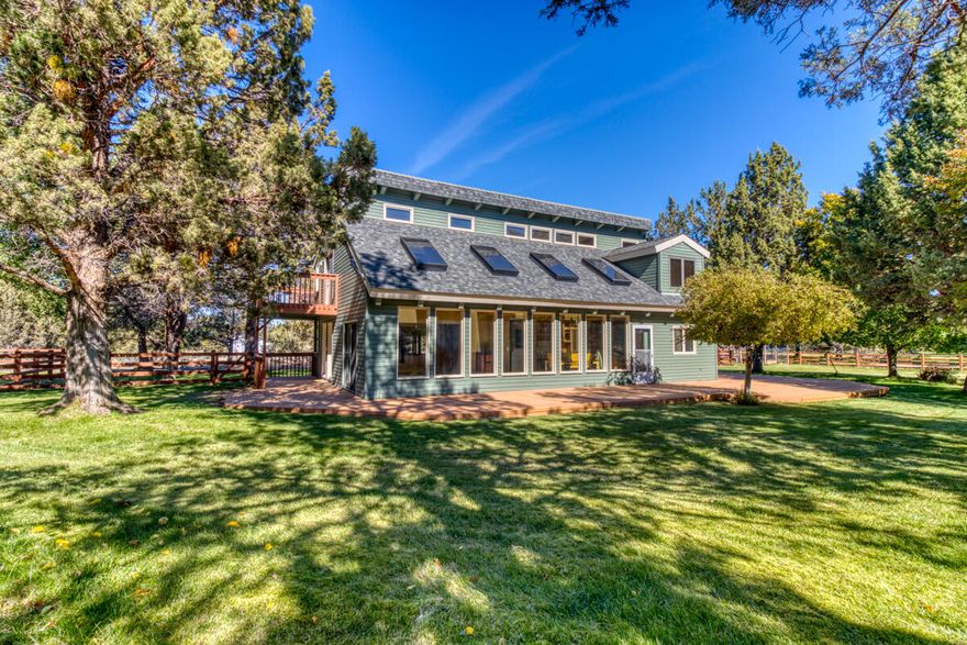 Don't miss this Rare opportunity to own in Old Deschutes! Highly desirable small acreage property a few blocks from Bend city limits & 1 mile from Pine Nursery Park. This
unique home sits on 2 fully fenced acres, with 1.57 direct piped irrigation. Light & Bright with beautiful vaulted beamed ceilings & Expansive windows to take in the
picturesque yard. Awesome detached 4-car garage/shop w/ wood stove & 220V electric. PLUS a 2-car attached garage. Multiple decks overlook the beautiful mature trees &
immaculate kept lawn, PERFECT for entertaining! Do you want the feeling of the country, but the convenience of being in the city? This is it! 

So much potential! Bring your farm animals or plenty of space for an ADU! Utilize for short term rentals or Future development opportunity! Buyer to do due dilligence.
