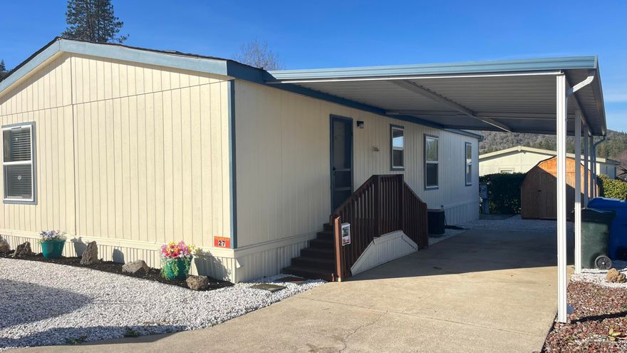 Located in the desirable 55+ Madrone Hills Park, this well-maintained 3-bedroom, 2-bath manufactured home offers comfortable living with minimal upkeep. Recent updates include fresh interior paint, new laminate flooring, and new carpet. The exterior requires very little maintenance, making it easy to enjoy your time. A long carport provides covered parking for up to two vehicles. Walk-in closets offer ample space for clothing and storage. Conveniently located near the golf course, with easy access to I-5 just down the road. Schedule a showing today to experience everything this home and community have 
to offer.