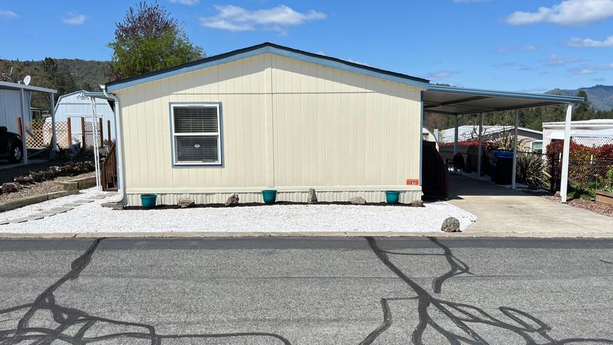 Located in the 55+ Madrone Hills park. This 3 bedroom, 2 bath manufactured home has been well taken care of. Updates include new paint, laminate flooring and carpet. Very little upkeep needed on the outside. Long carport for 2 cars when needed. Walk-in closets offer more room for clothes and storage. Golf course is close by and I5 is just down the road. Schedule a showing today to see what all the home and park have to offer.