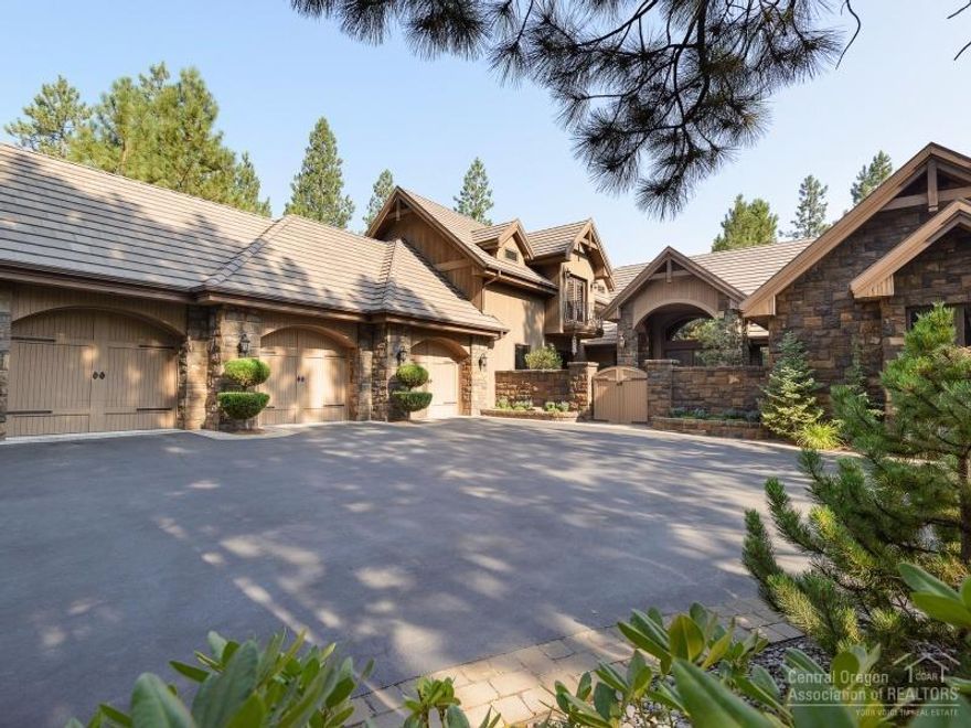 Nestled in a very private park-like setting along Broken Top's 12th fairway, this extraordinary custom home has it all. Single level living with bonus theater room upstairs and features including 3 en-suites, study, fantastic gourmet kitchen with double ovens and all of the amenities, entertaining area with full bar and 400 bottle wine room, 4 fireplaces and outdoor gas firepit, outdoor kitchen and more. This is a one of a kind property with too many high-quality features to list. A must see!