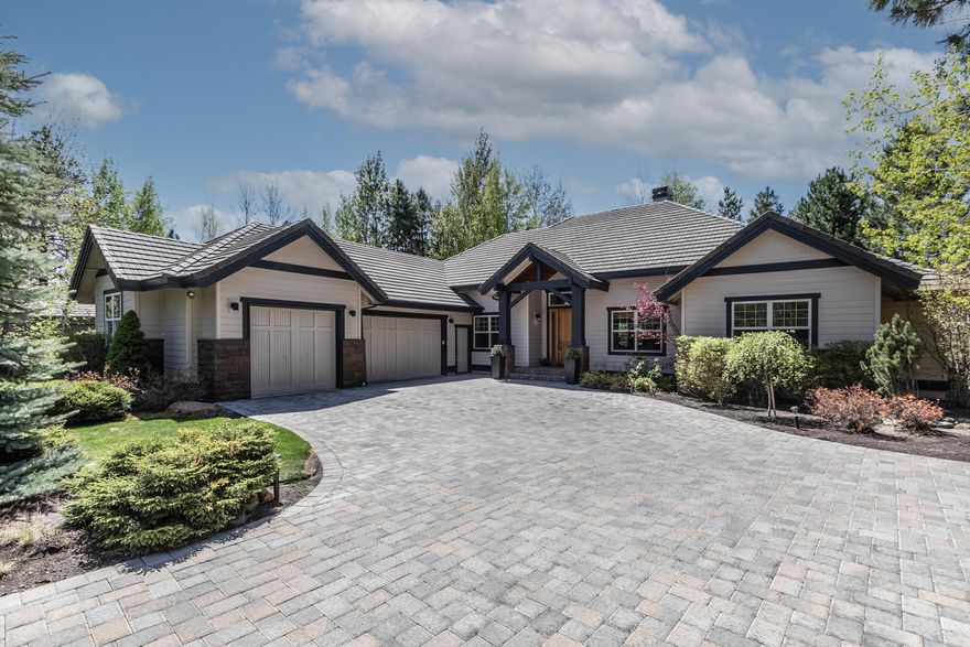 Lovely SINGLE LEVEL custom home in the golf community of Broken Top. This thoughtfully designed & quality-built home features an open, airy floor plan w/ a formal dining room, office/den & a spacious great room with tall, tray ceilings, wood accents, stone gas fireplace, built-ins & hardwood floors. French doors open to the paver back patio & out to a landscaped, well manicured back yard, offering a perfect spot for morning coffee or gatherings w/ family and friends. Newer appliances, maple cabinets, granite tiles, large island, pantry & a built-in desk complete the kitchen. The primary suite includes a walk-in closet, jetted tub & access to an enclosed private, patio- ideal for a hot tub or your own private sanctuary. Attractive curb appeal w/ freshly painted exterior, gorgeous paver driveway & 3 car garage w/ epoxy floors. This warm & comfortable home has been lovingly maintained & is close to Mt Bachelor, the Deschutes River, miles of hiking and biking trails & minutes to town!