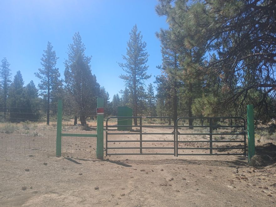 READY TO BUILD! This 2.3 acre lot has a well, new standard leach field septic system, and is waiting for power to be hooked up. Zoned residential w/ legal access this level lot is fully fenced w/gate & ready to build your home, cabin, or place a manufactured/tiny home. Power pole on property is wired with (2)110V  GFCI outlets & (2) 30amp RV outlets. All the work has been done so don't miss this opportunity at a bargain price!