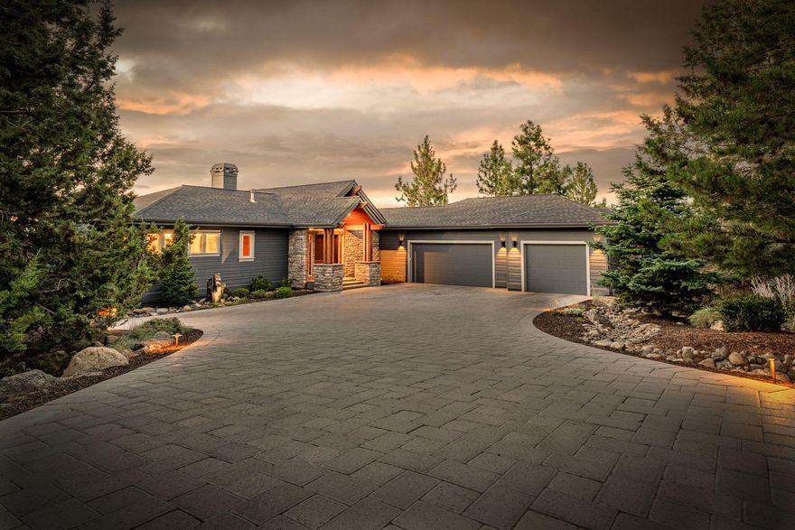 Welcome to this stunning Awbrey Butte home offering breathtaking mountain views and luxury at every turn. Featuring 3 spacious bedrooms with en suites, including a main-level primary with patio access, Brian's Custom closet, and spa-like bath with soaking tub and tiled shower. The gourmet kitchen is a chef's dream with high-end appliances, wine fridge, walk-in pantry, and oversized island. Enjoy seamless indoor-outdoor living with a new composite deck, flat driveway, and private outdoor spaces. Additional highlights include a wine cellar, bonus/flex room ideal for an office or gym, and a 3-car oversized garage. With a brand-new roof in 2025, this home blends elegance, comfort, and function in one of Bend's most desirable locations. Best of all, this beautiful home comes furnished for a truly move-in ready experience! Open House Saturday 2-4 and Sunday 12-2