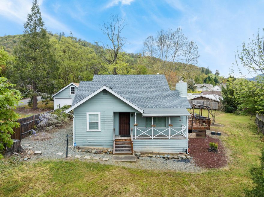 Check out this spacious 3-bed, 2-bath adorable home on a sprawling .4-acre lot! Enjoy gatherings on the expansive deck overlooking scenic views, with a sizable yard for all the garden enthusiasts. Fully fenced for privacy, with a detached garage with large workshop space, or a conversion to an ADU? Inside, a remodeled kitchen showcases a stunning gas range, and updates grace every corner of this 1362 sqft gem. Convenience meets charm—your dream home awaits!