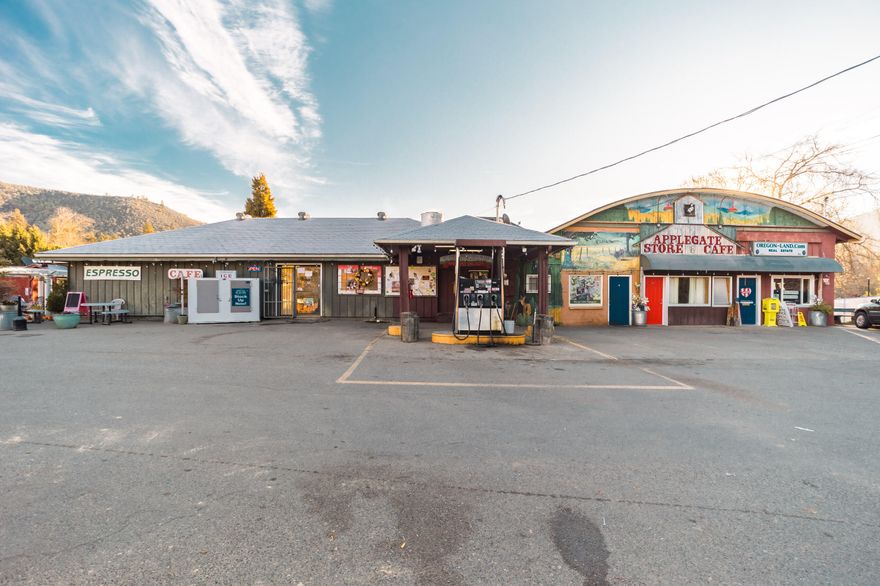 Commercial property in the heart of the Applegate Valley. With gas station, cafe, and convenience store. This property has five income producing leases. All businesses on this property are all well established and thriving. Property has been well maintained by the same family for last 20 years. Upgrades include a high producing well in 2019 and a new roof. Property also includes an acre of vacant commercial land for the new owners to develop to increase income. All tenants on the property have leases and wish to stay. Property also has a 2 bedroom, 1 bath house with a big yard and great views. Agent is related to owners of property