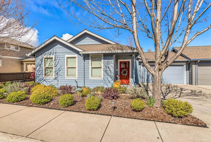 This professionally designed home takes advantage of stunning mountain views through walls of windows from the vaulted living, dining and kitchen area. Great room design with skylights, gas fireplace and custom built-in cabinetry opens to a deck for added outdoor living. Main floor master suite with custom tile shower, double vanity and walk-in closets and views of snow-covered Mt Ashland. The versatile floor plan allows complete main level living while the lower level provides high ceilings for three bedrooms, full bath and spacious laundry room. Lower level contains bonus 14x24 room ideal for a wine cellar or other storage, plus additional patio space, fenced yard/garden and low-maintenance landscaping. Two-car garage and recent exterior paint. This is a must see home!
