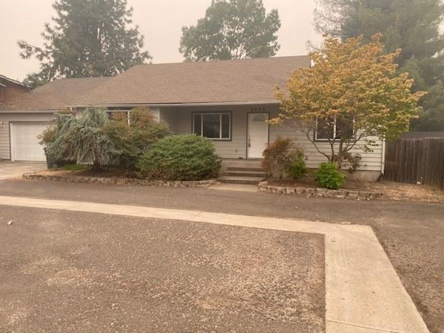 This single level home is has a split floor plan and is located on a
quiet street in a private setting. There is a large kitchen and dining room. Other features include two solar tubes, laundry room,
gas fireplace, covered front porch, and a huge deck in the back yard.